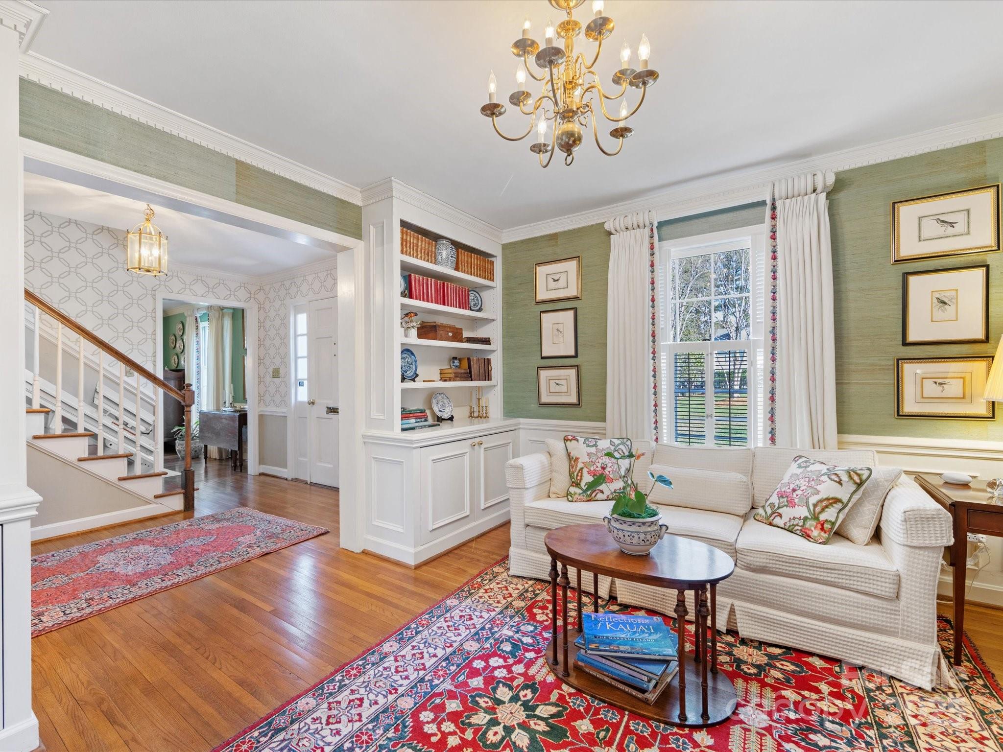 555 Manning Drive, Unit 7 Charlotte, NC 28209 - Photo 8 of 45 a living room with furniture and a table