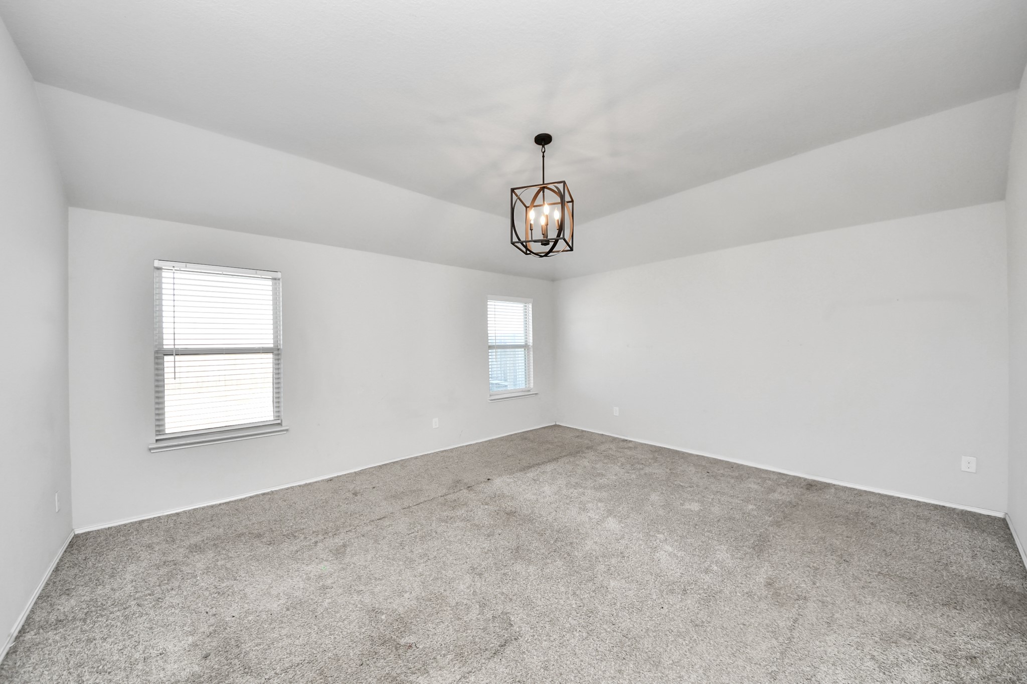 619 Ashley Falls Lane Rosharon, TX 77583 - Photo 17 of 31 The primary suite is conveniently located downstairs, offering privacy and comfort away from the secondary bedrooms.