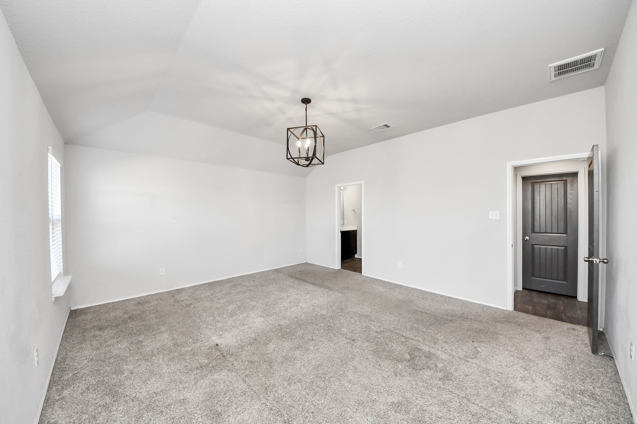 619 Ashley Falls Lane Rosharon, TX 77583 - Photo 18 of 31 This spacious retreat is large enough for a king-size bed and sitting area, and it provides a relaxing escape at the end of the day.