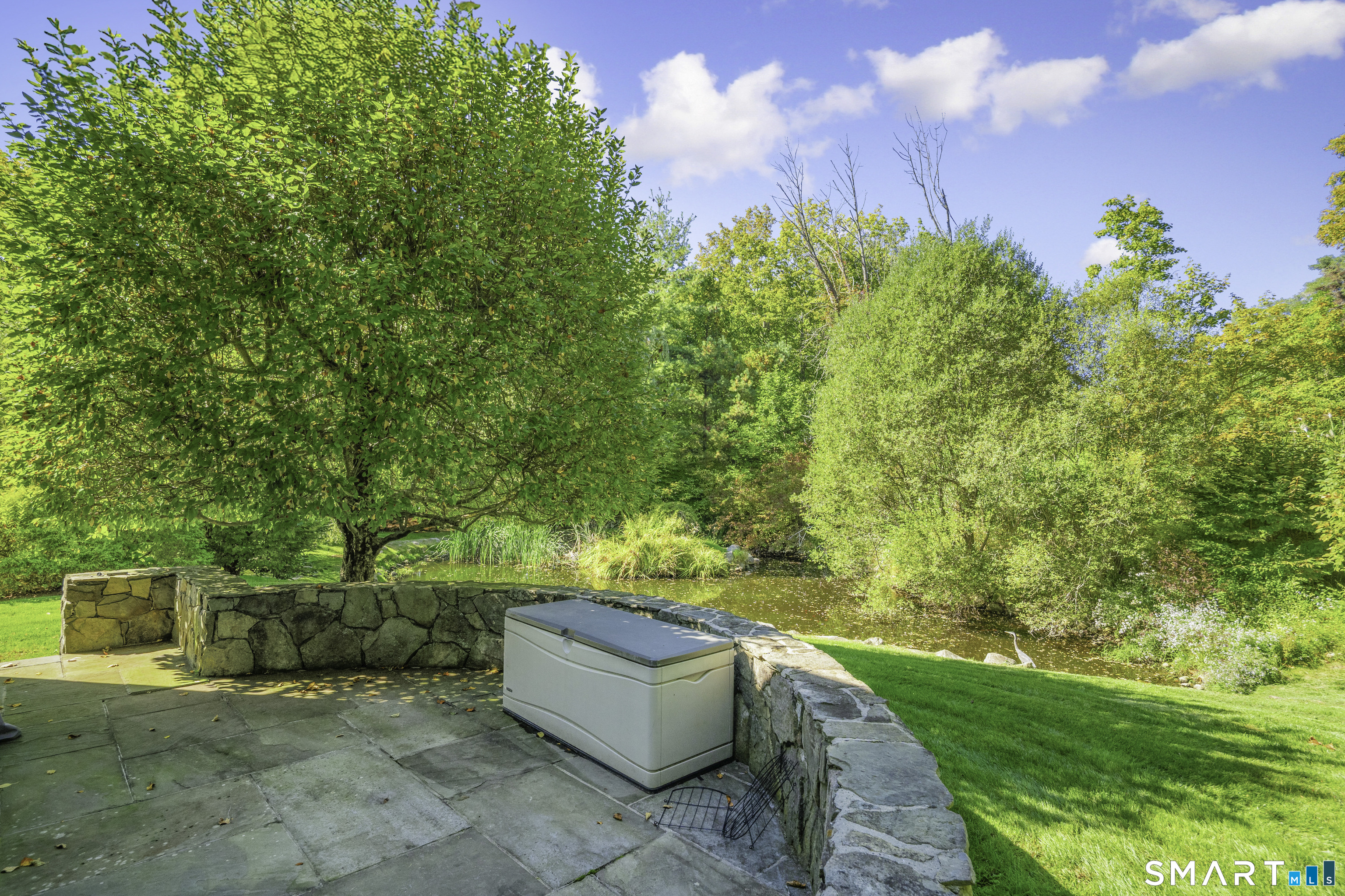 113 Brushy Ridge Road New Canaan, CT 06840 - Photo 40 of 40 Terrace Outside the Library overlooking the koi pond