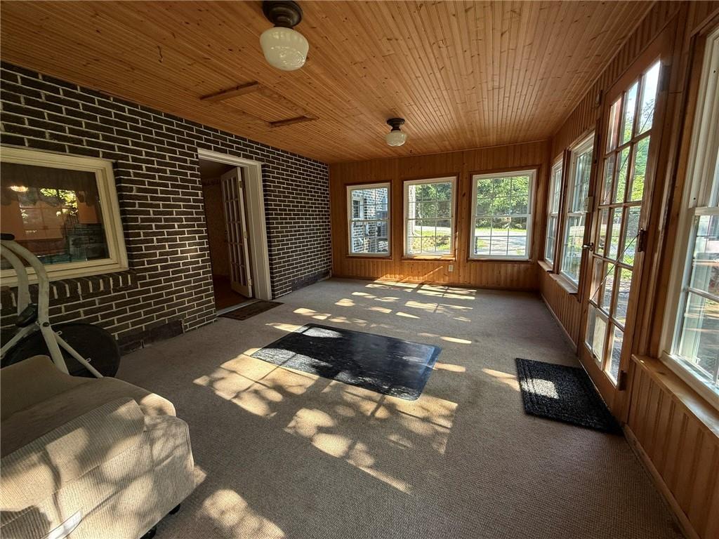 960 Watt Road Apollo, PA 15613 - Photo 22 of 24 a view of an empty room with a fireplace and a flat screen tv