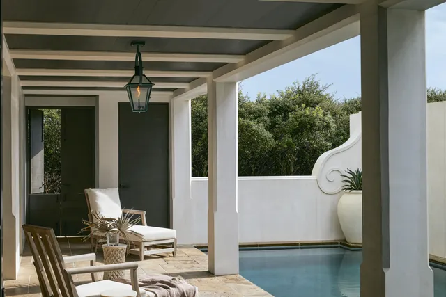 a view of living room with furniture and chandelier