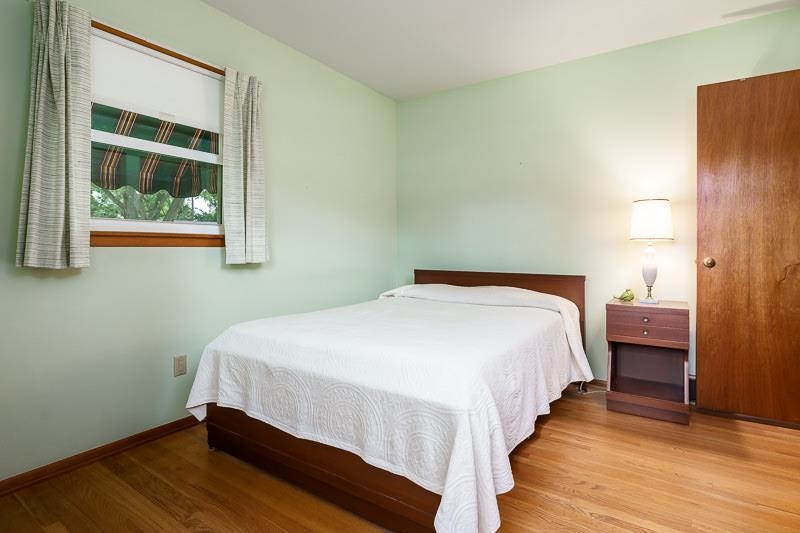 4702 Mohawk Road Rockford, IL 61107 - Photo 19 of 41 a bedroom with a bed and a window