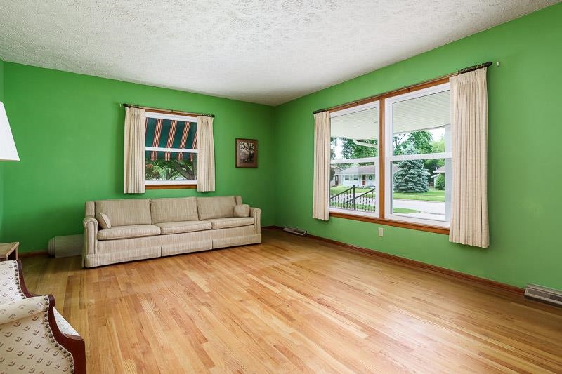 4702 Mohawk Road Rockford, IL 61107 - Photo 6 of 41 a living room with furniture and a window