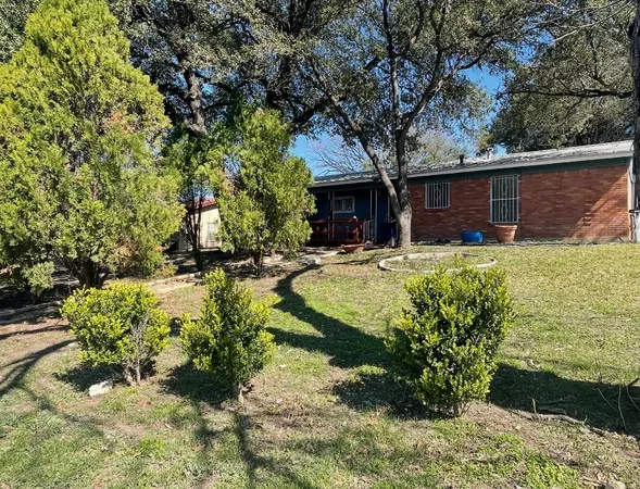 a view of a house with swimming pool