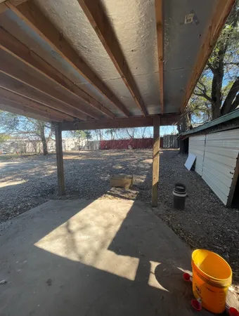 a view of a backyard of a house