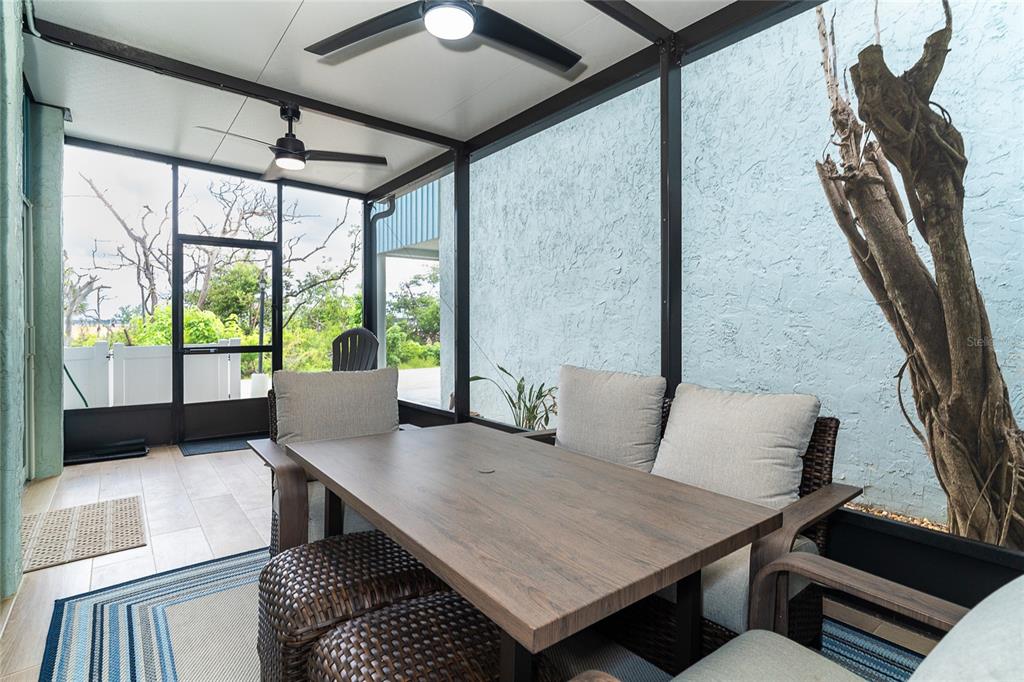 6005 North Beach Road, Unit 16 Englewood, FL 34223 - Photo 20 of 57 a living room with furniture and a window
