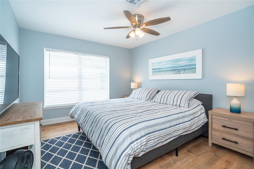 6005 North Beach Road, Unit 16 Englewood, FL 34223 - Photo 23 of 57 a bedroom with a bed and a window