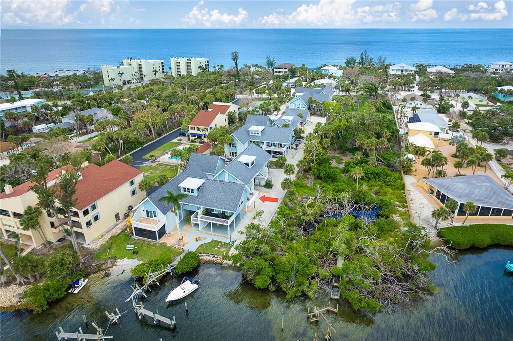 6005 North Beach Road, Unit 16 Englewood, FL 34223 - Photo 46 of 57 an aerial view of residential house with outdoor space and swimming pool