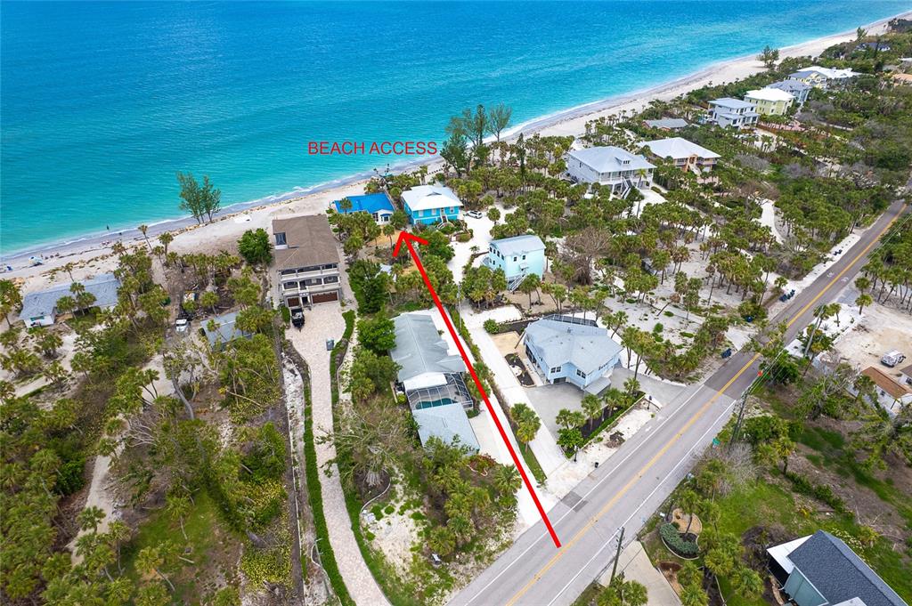 6005 North Beach Road, Unit 16 Englewood, FL 34223 - Photo 5 of 57 a picture of floor to ceiling window with outdoor area