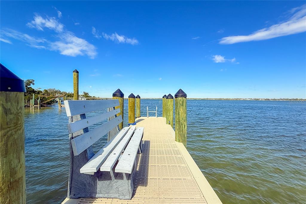 6005 North Beach Road, Unit 16 Englewood, FL 34223 - Photo 53 of 57 a view of a balcony with two chairs