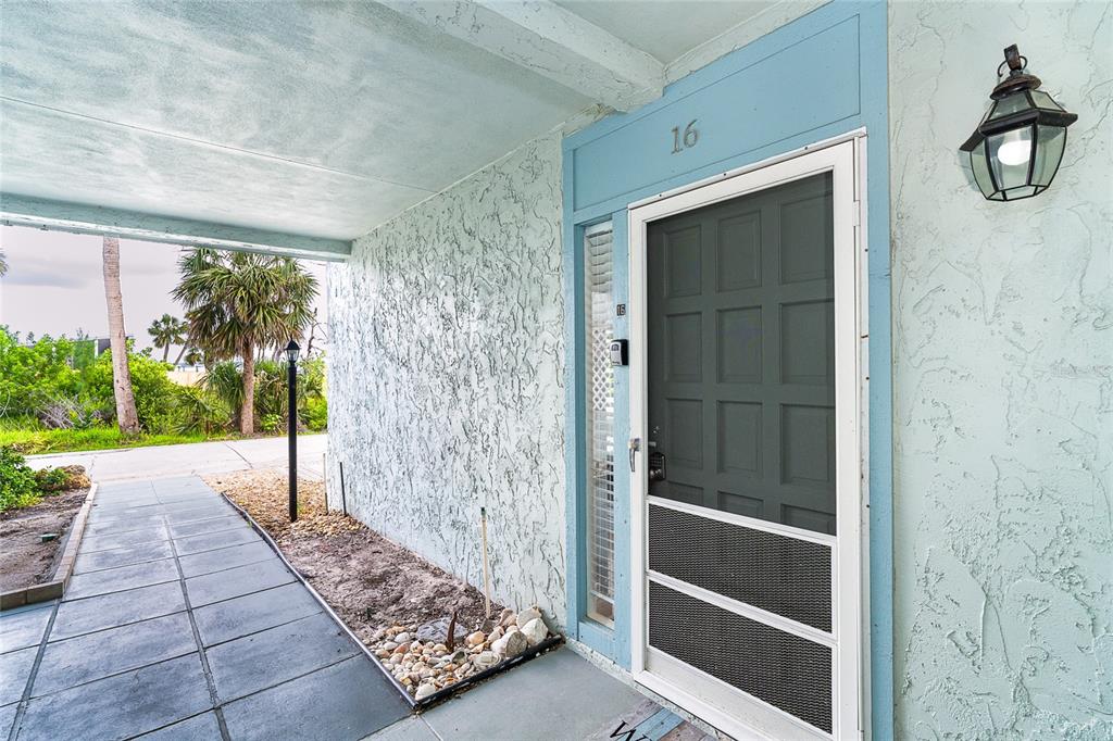 6005 North Beach Road, Unit 16 Englewood, FL 34223 - Photo 6 of 57 a view of front door of house