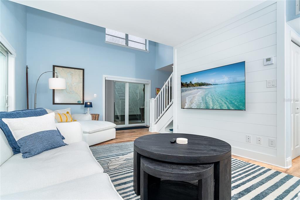 6005 North Beach Road, Unit 16 Englewood, FL 34223 - Photo 7 of 57 a living room with furniture and a flat screen tv