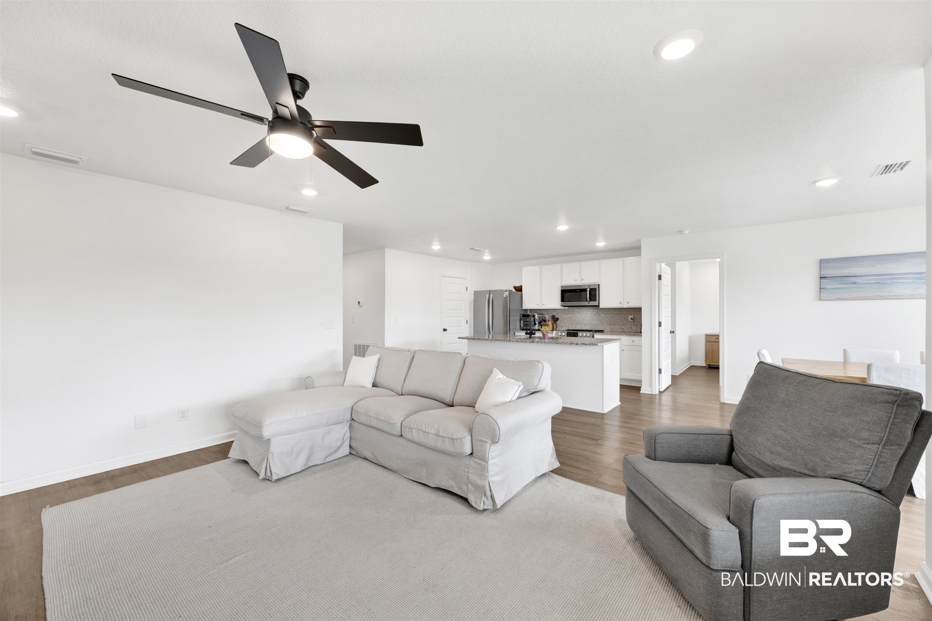 10763 Paget Drive North Mobile, AL 36608 - Photo 10 of 24 Living room with light wood-style flooring, recessed lighting, and a ceiling fan