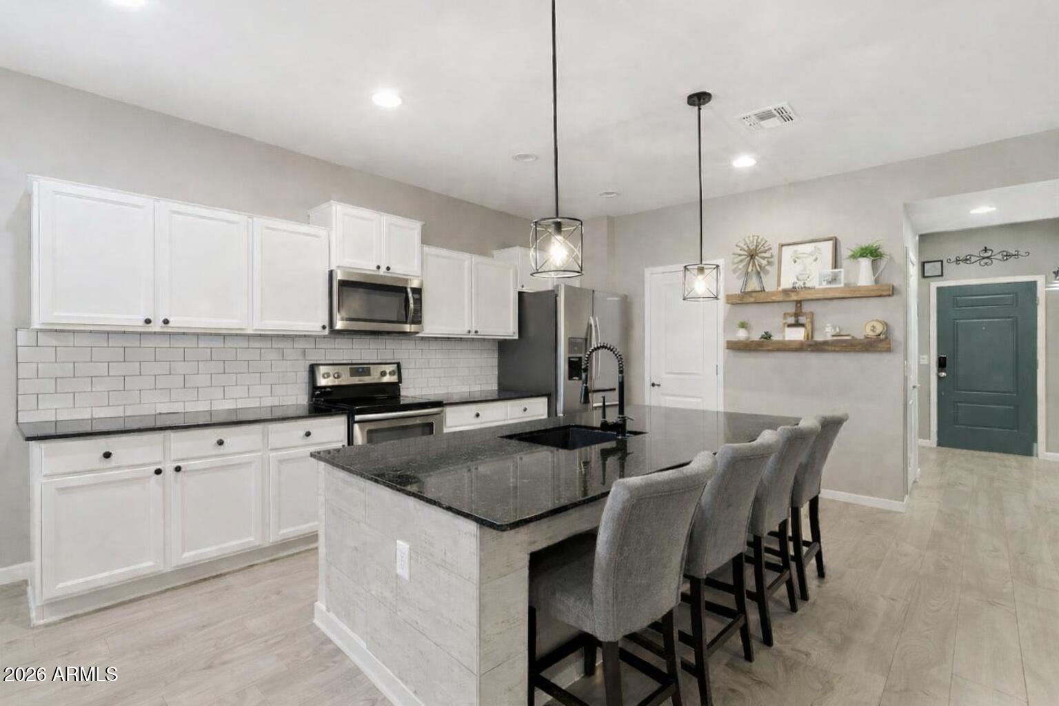 23892 West Watkins Street Buckeye, AZ 85326 - Photo 3 of 22 74921A69-9F82-448C-86DD-F12C242BFA00