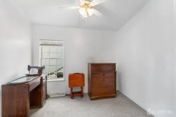 a room with furniture and window