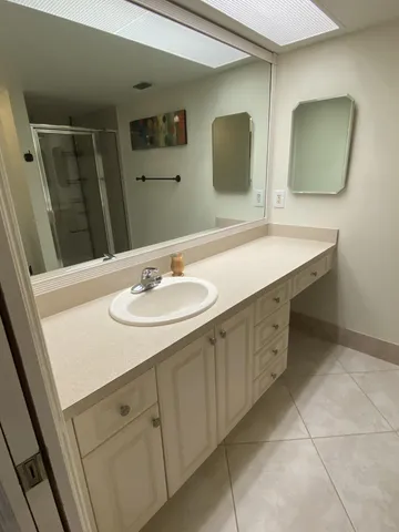a bathroom with a toilet and a sink