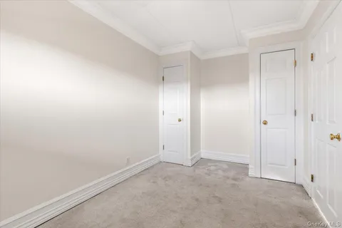 a en suite bathroom with a shower sink and a mirror