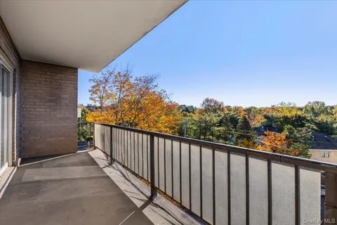 a balcony with street view