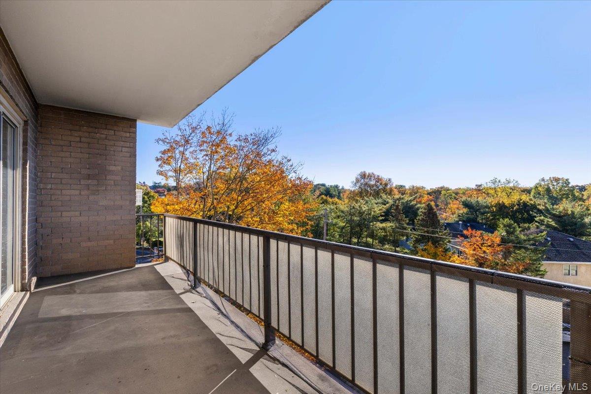 470 Halstead Avenue, Unit 5E Harrison, NY 10528 - Photo 2 of 22 a balcony with street view