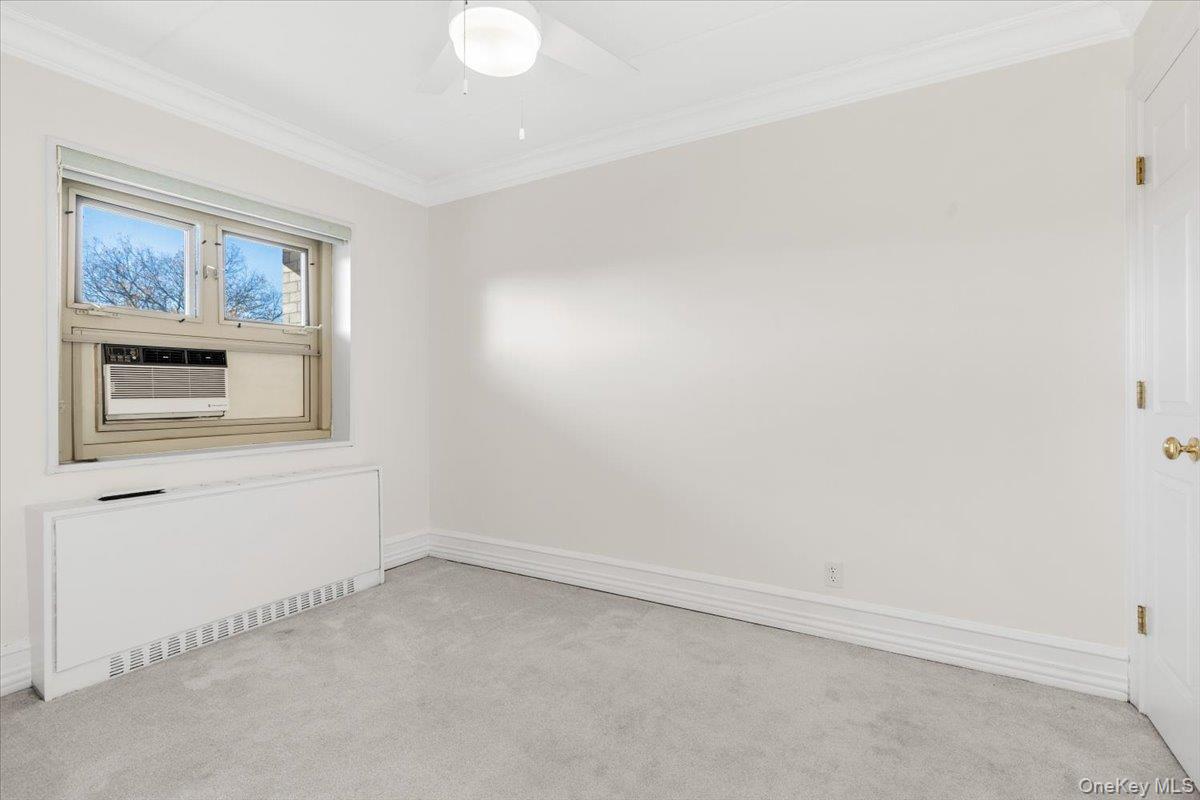 470 Halstead Avenue, Unit 5E Harrison, NY 10528 - Photo 10 of 22 an empty room with a window