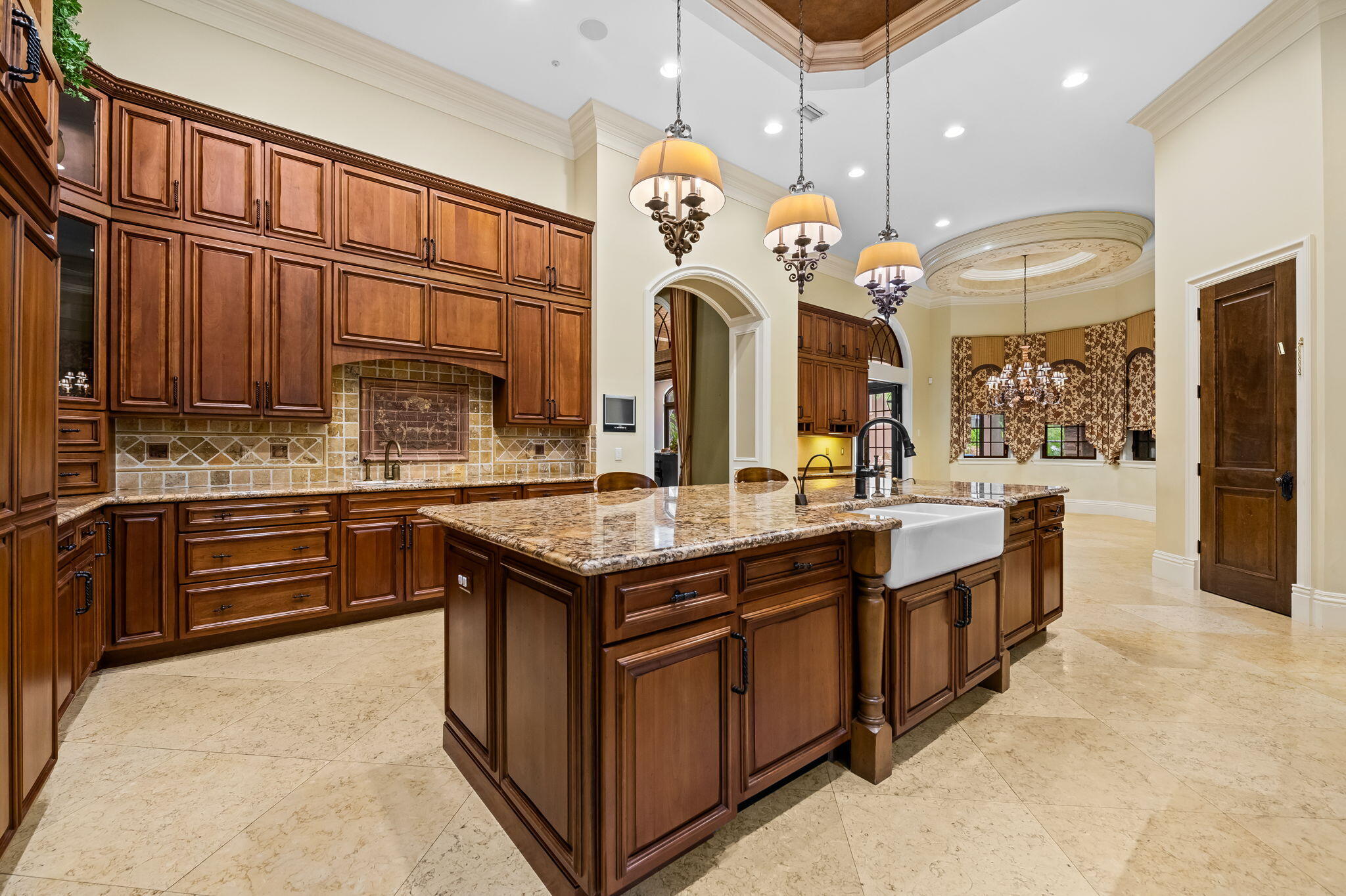 6300 Riverside Drive Parkland, FL 33067 - Photo 38 of 105 a kitchen with stainless steel appliances granite countertop a stove and cabinets