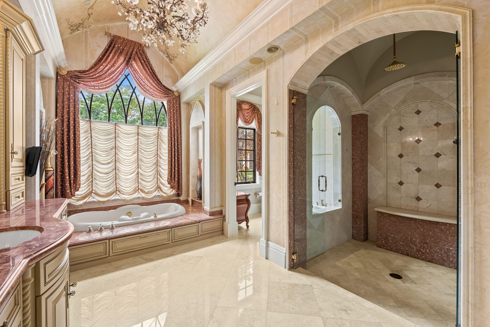 6300 Riverside Drive Parkland, FL 33067 - Photo 66 of 105 a view of spacious bathroom with a tub shower and mirror