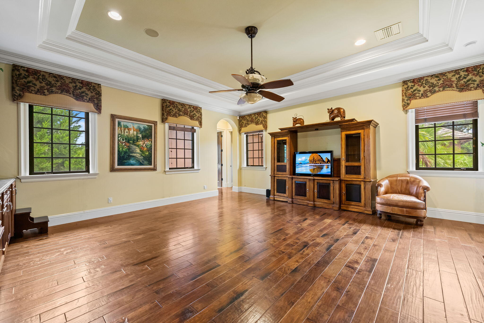 6300 Riverside Drive Parkland, FL 33067 - Photo 71 of 105 a living room with furniture and a flat screen tv