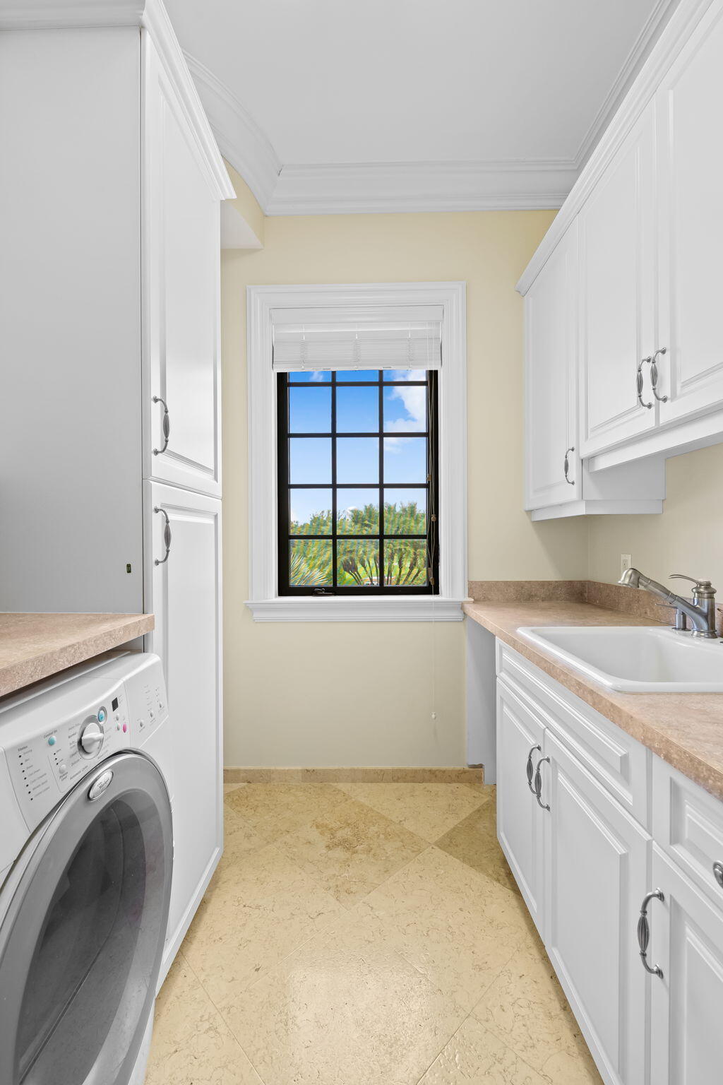 6300 Riverside Drive Parkland, FL 33067 - Photo 78 of 105 a view of a kitchen with washer and dryer