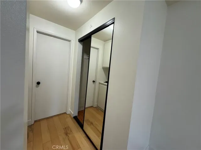 a view of a bathroom with a tub and shower