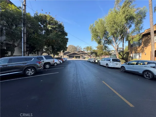 a swimming pool with outdoor seating and yard