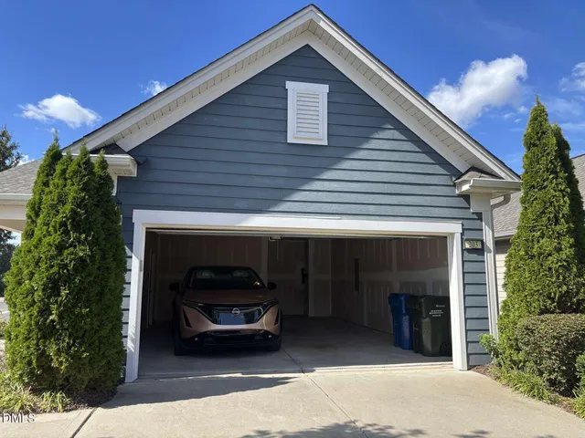 a front view of a house with a garage