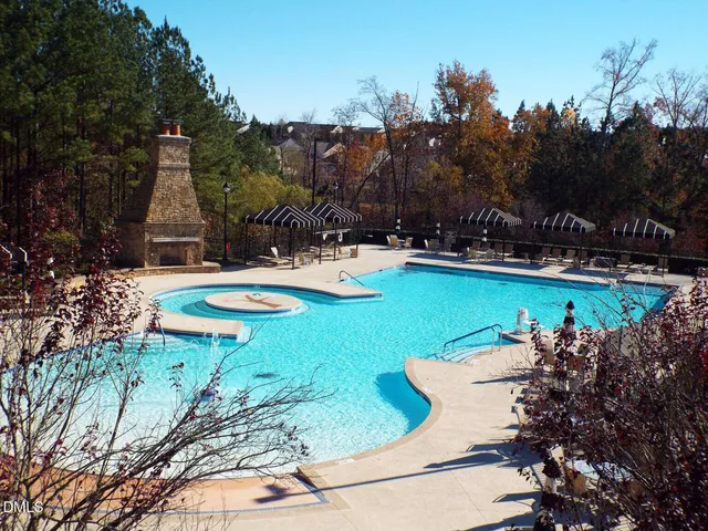 a view of a swimming pool with outdoor space