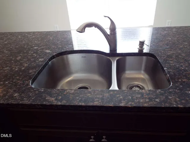 a close view of sink and tap