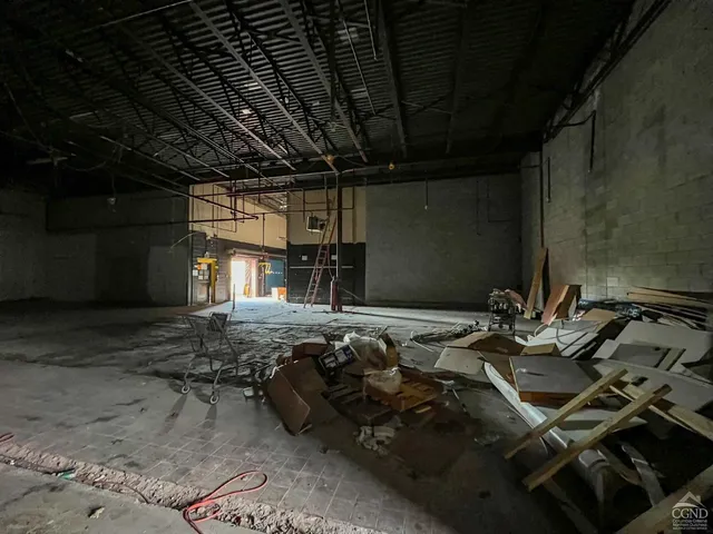 a room with lots of wooden furniture