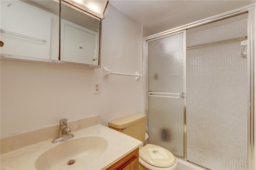 1505 North Riverside Drive, Unit 1208 Pompano Beach, FL 33062 - Photo 35 of 62 a bathroom with a sink toilet and vanity