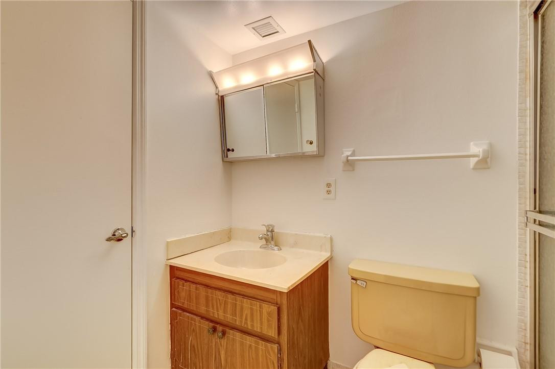 1505 North Riverside Drive, Unit 1208 Pompano Beach, FL 33062 - Photo 36 of 62 a bathroom with a sink and a mirror