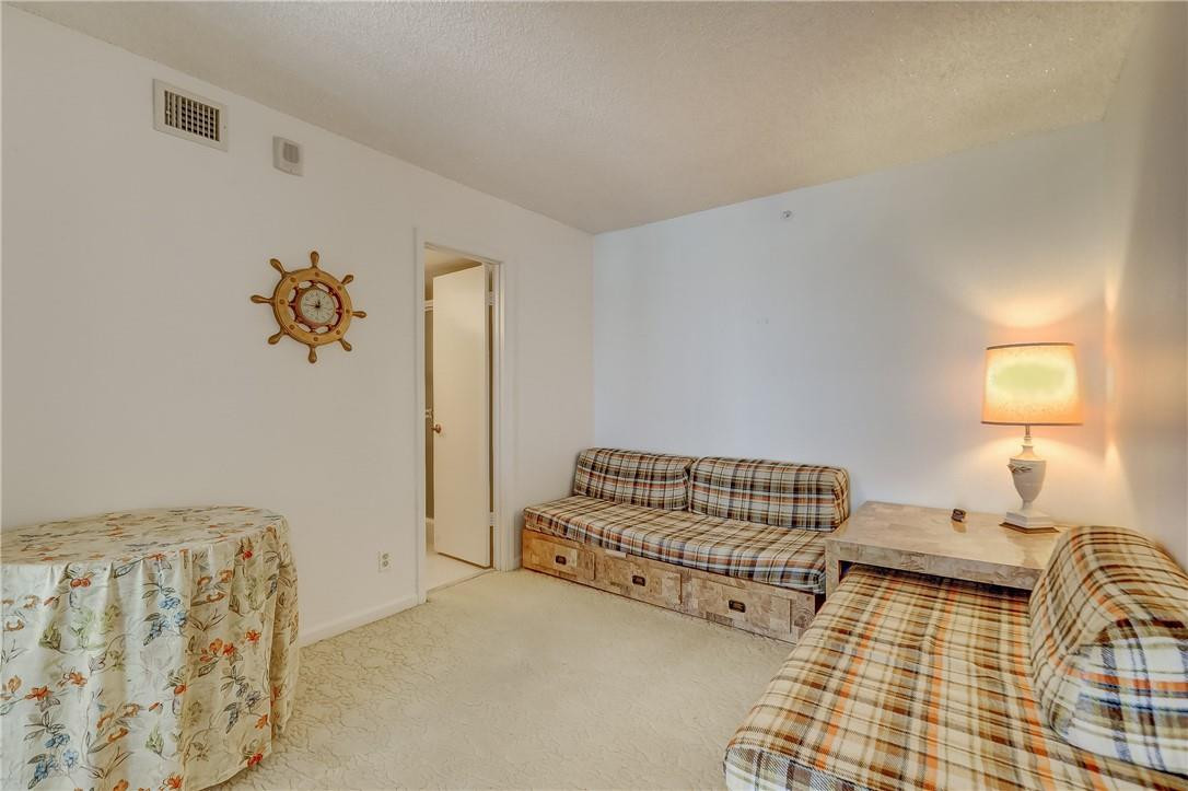 1505 North Riverside Drive, Unit 1208 Pompano Beach, FL 33062 - Photo 38 of 62 a living room with furniture flowerpot and window