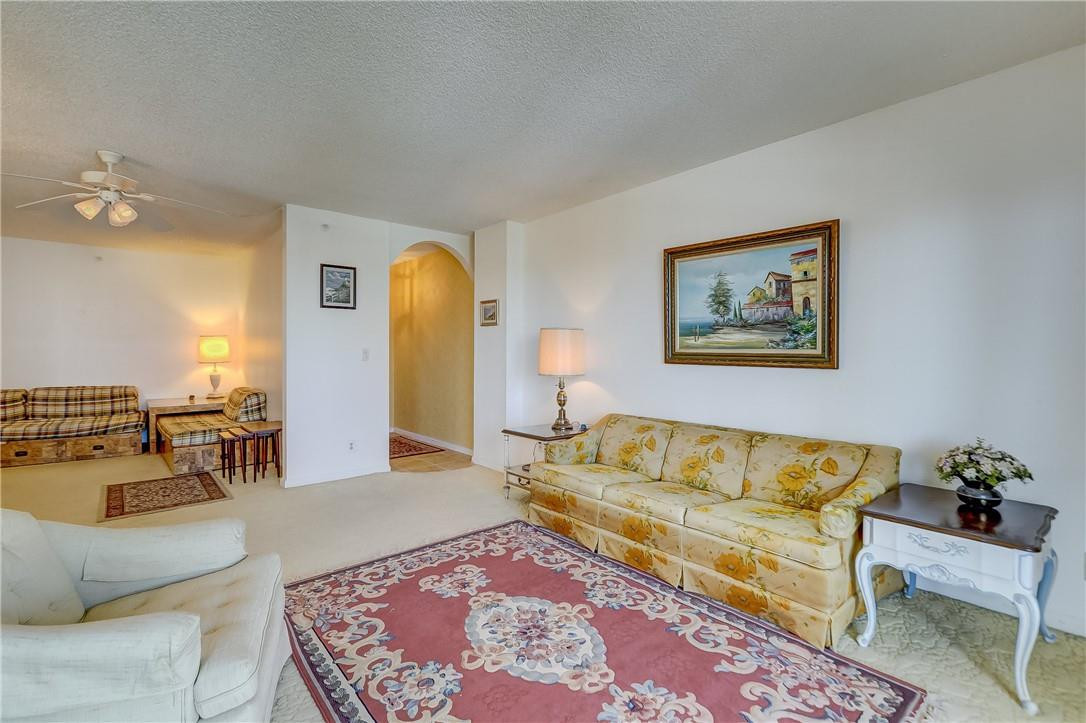 1505 North Riverside Drive, Unit 1208 Pompano Beach, FL 33062 - Photo 50 of 62 a living room with furniture and a couch
