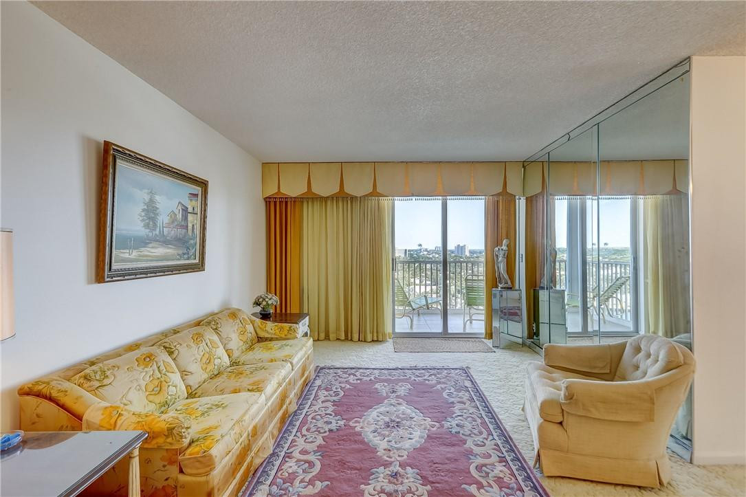 1505 North Riverside Drive, Unit 1208 Pompano Beach, FL 33062 - Photo 55 of 62 a living room with furniture and a large window