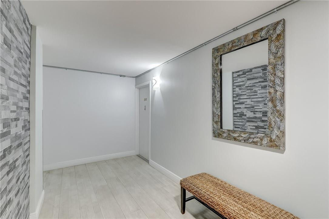 1505 North Riverside Drive, Unit 1208 Pompano Beach, FL 33062 - Photo 60 of 62 a bathroom with a toilet a sink and mirror