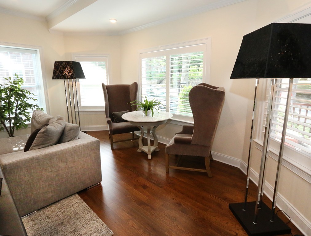 134 Salisbury Road, Unit 2 Brookline, MA 02445 - Photo 8 of 20 a living room with furniture and a window