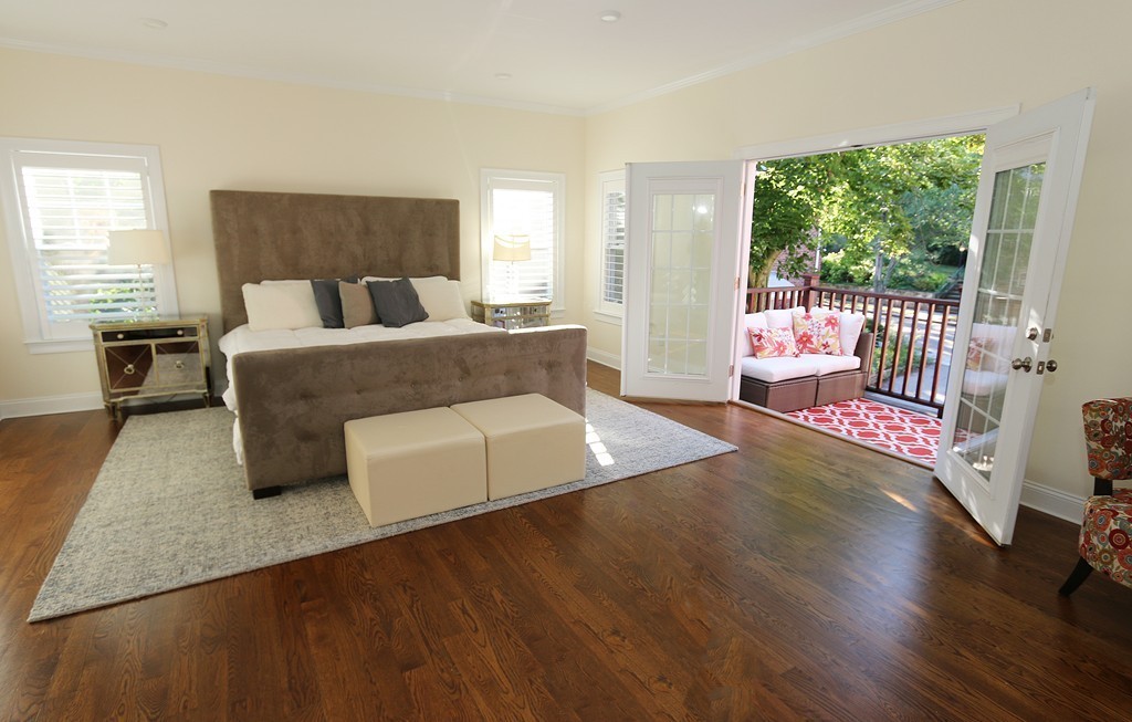 134 Salisbury Road, Unit 2 Brookline, MA 02445 - Photo 10 of 20 a living room with furniture and a large window
