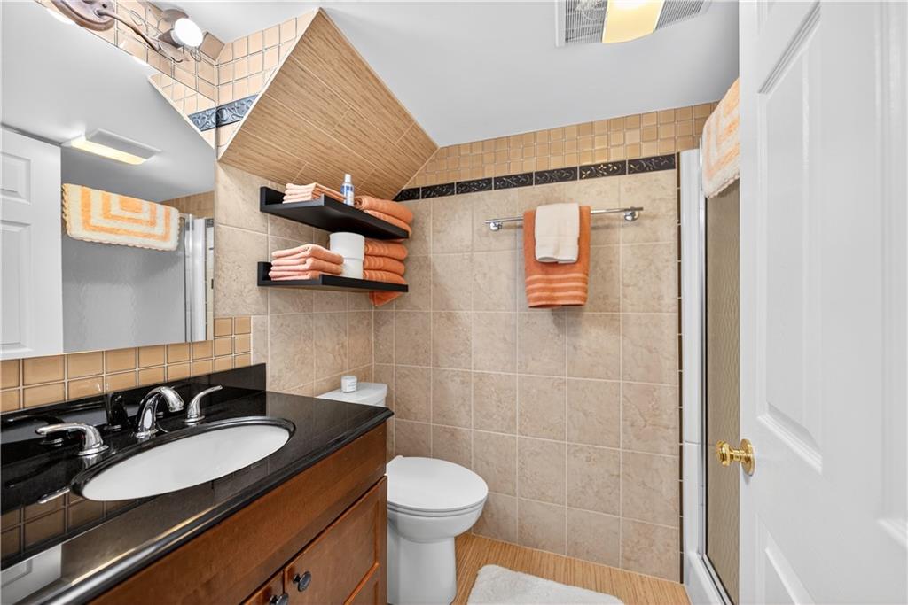 509 Woodland Road Pittsburgh, PA 15237 - Photo 42 of 49 Downstairs bathroom and accessible from the pool area