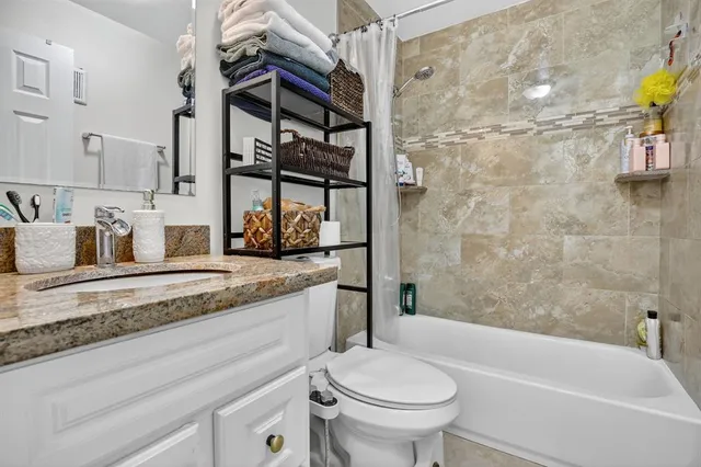 a swimming pool with outdoor seating and yard