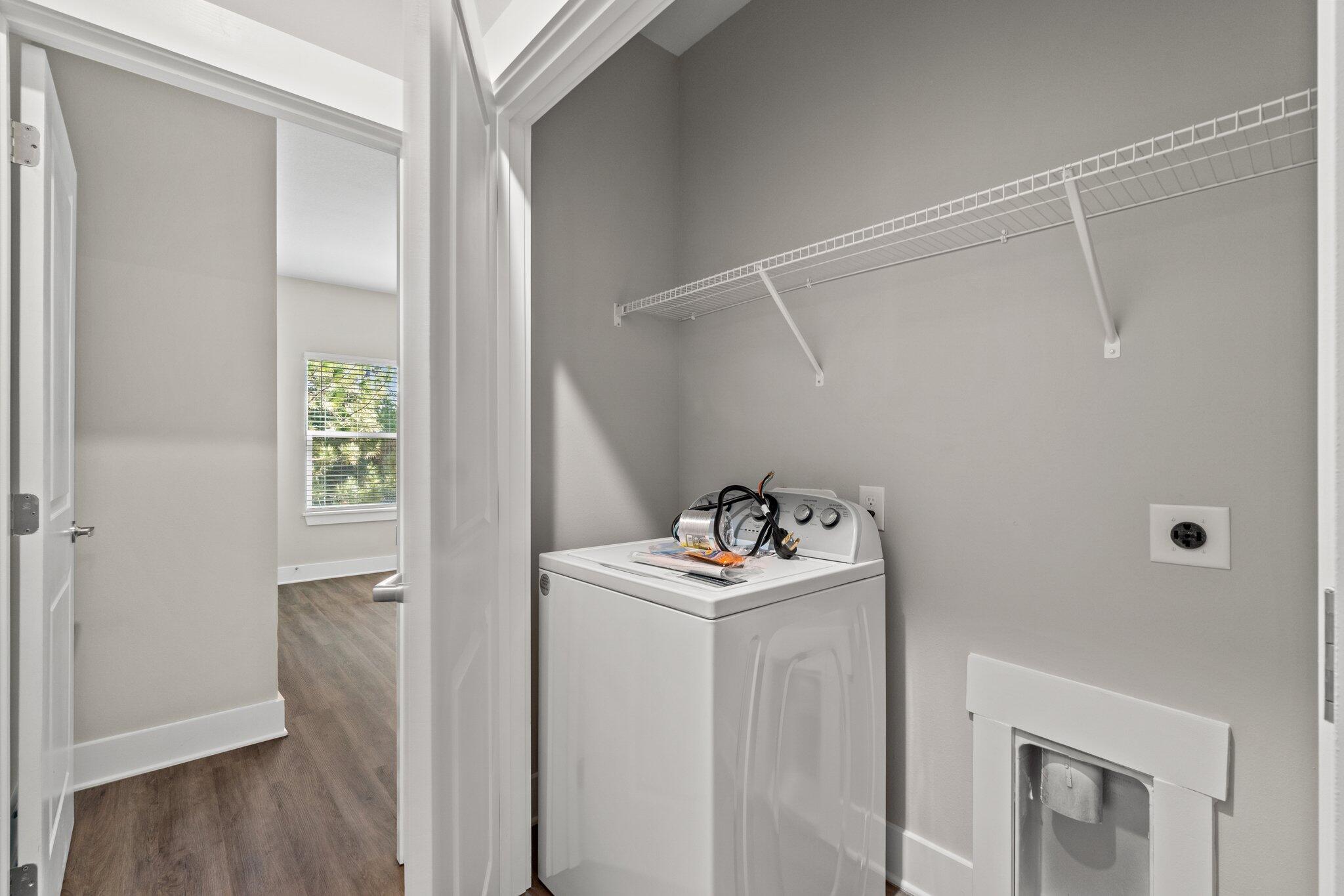 274 Date Palm Lane, Unit HORIZON Freeport, FL 32439 - Photo 23 of 28 a room with storage and utility