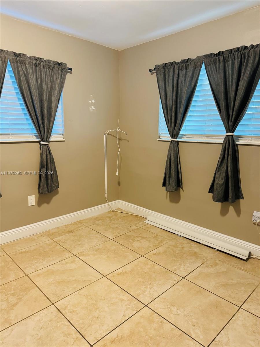 4734 Southwest 4th Street Miami, FL 33134 - Photo 16 of 23 a view of a room with storage and utility