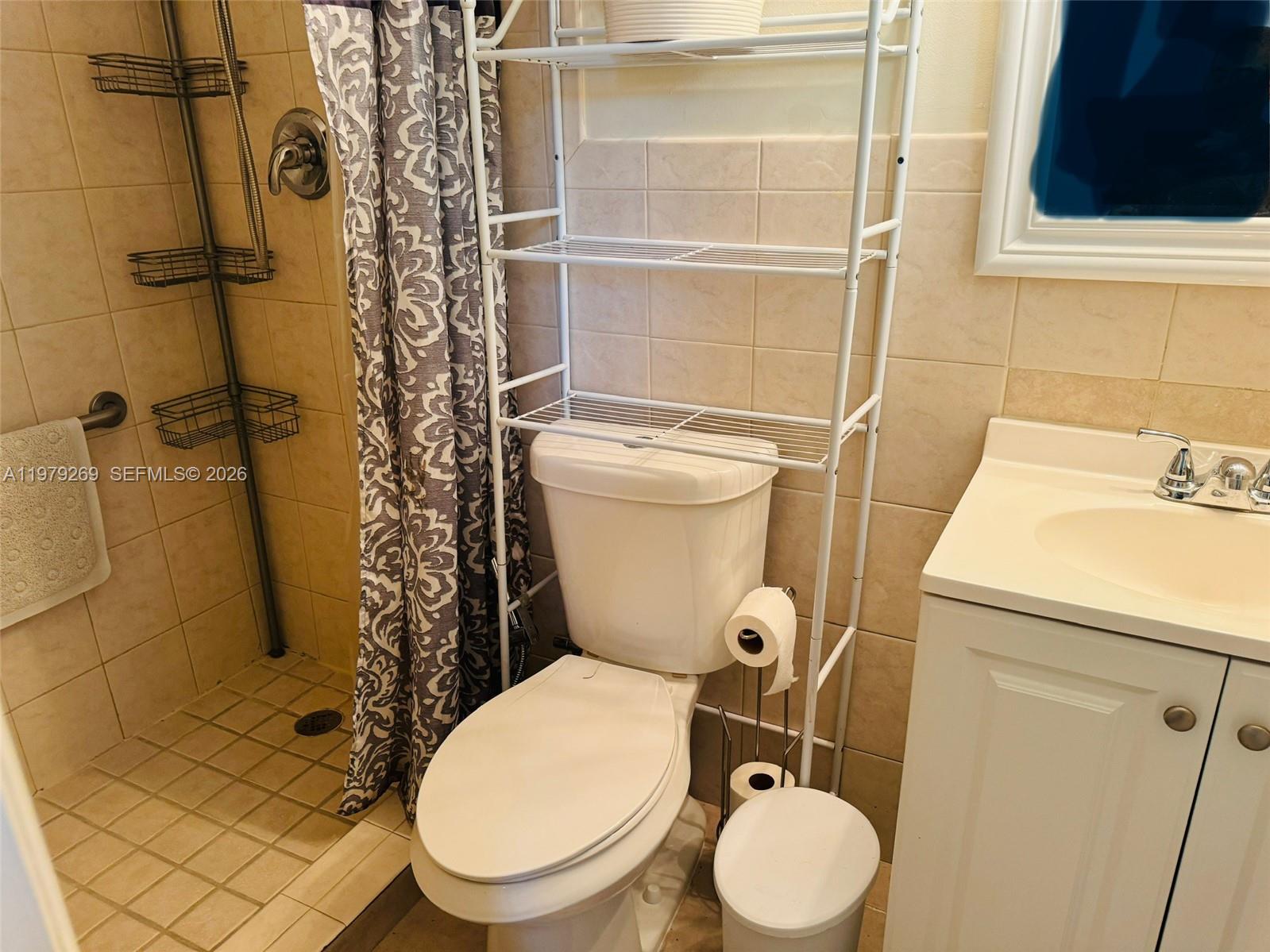 4734 Southwest 4th Street Miami, FL 33134 - Photo 20 of 23 a bathroom with a toilet and a shower
