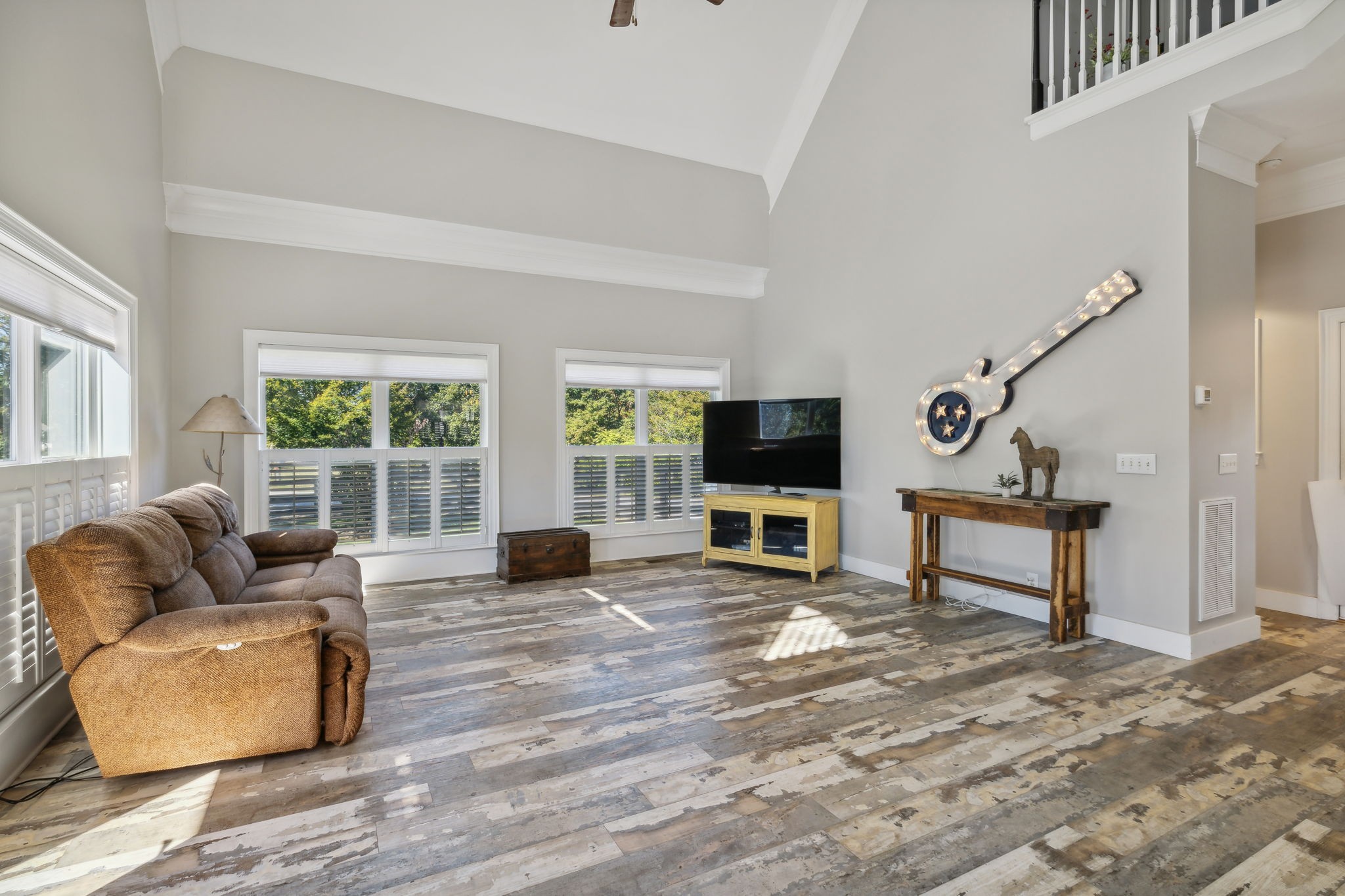 4325 Cave Springs Road Santa Fe, TN 38482 - Photo 64 of 98 a living room with furniture a fireplace and a flat screen tv