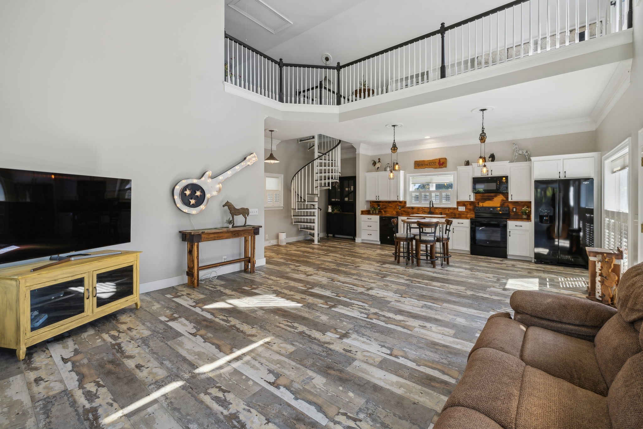4325 Cave Springs Road Santa Fe, TN 38482 - Photo 65 of 98 a living room with furniture and a flat screen tv
